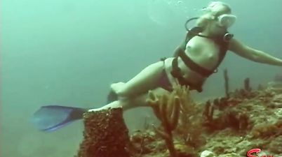 Shameless nude girl under water